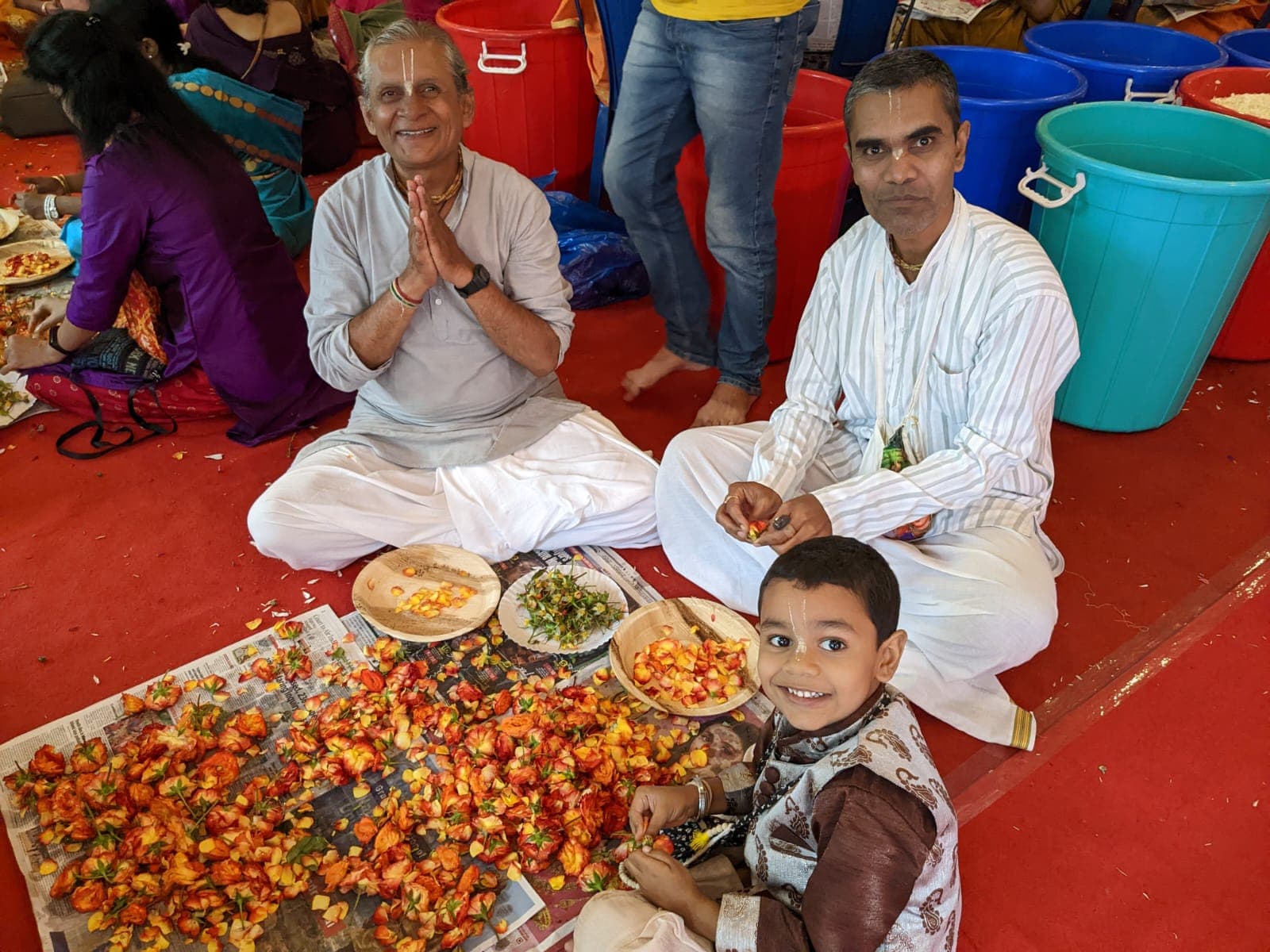 Devotees cooking prasadam together